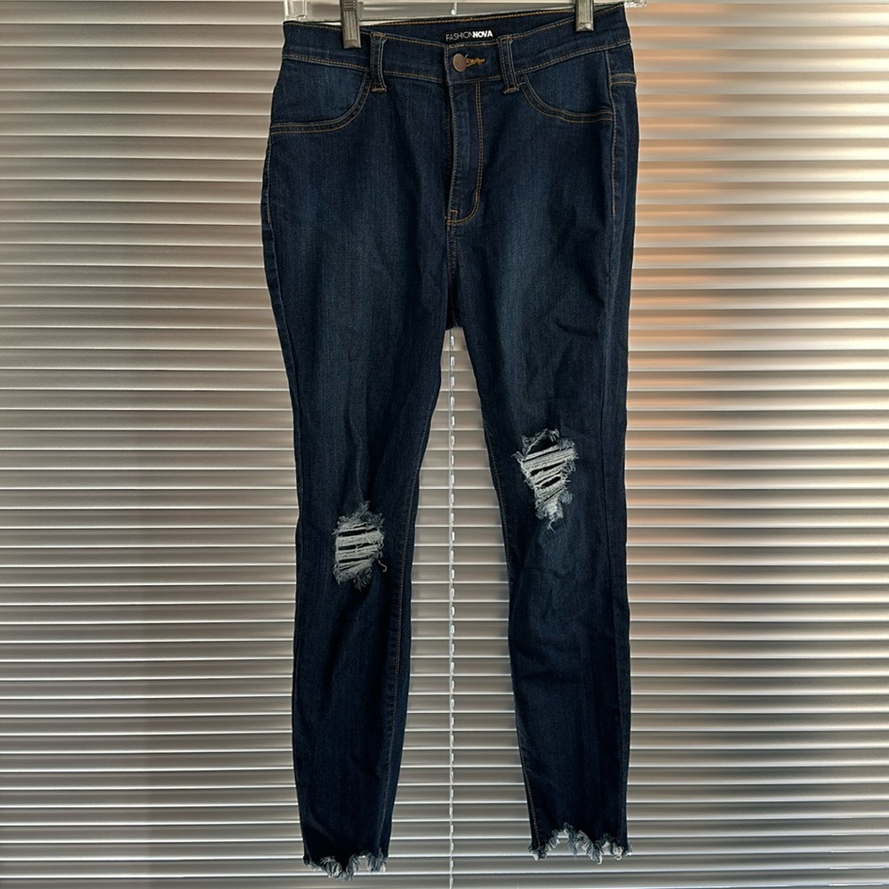 Dark blue ripped jeans